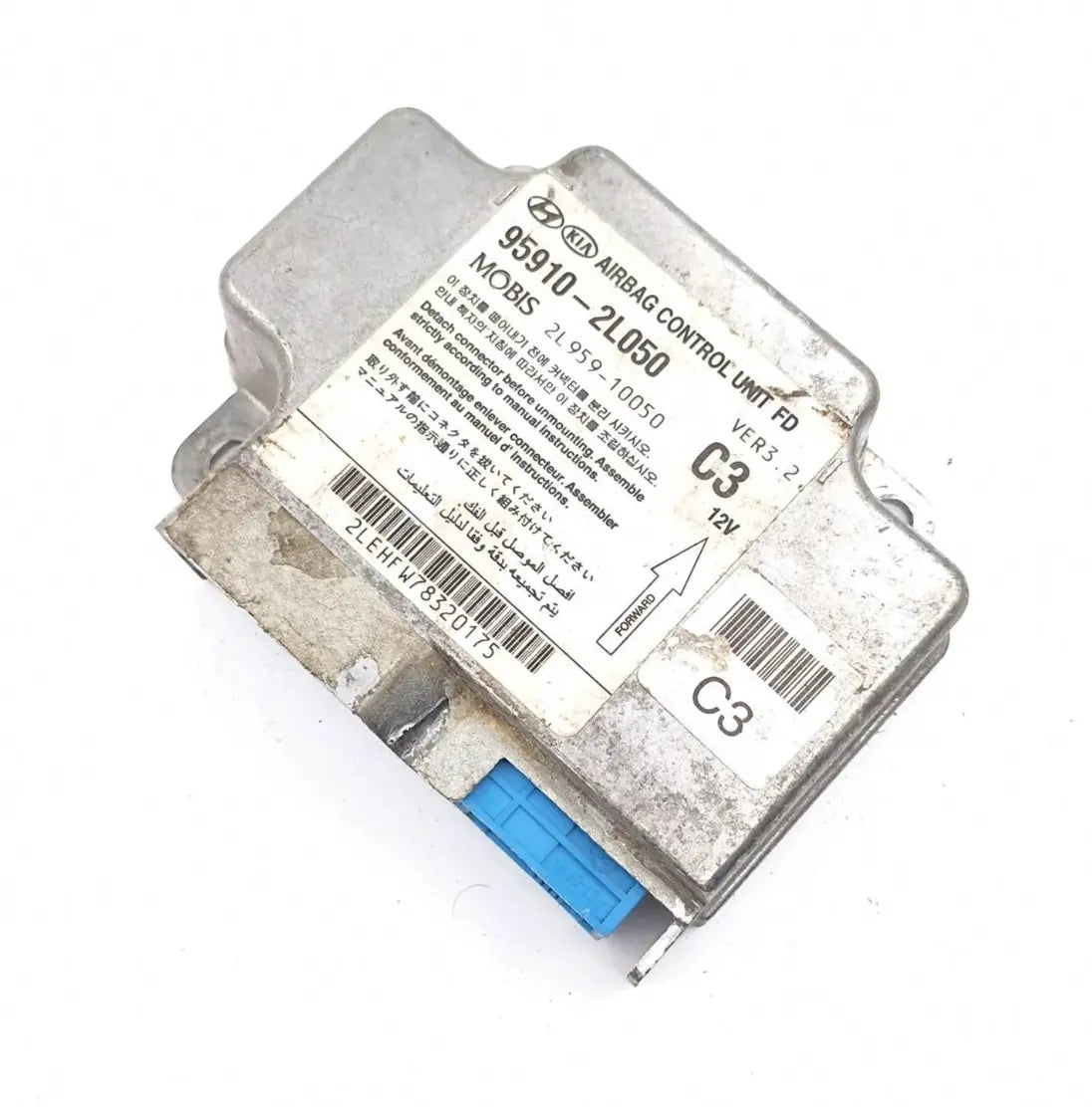 Photo du calculateur airbag Hyundai Mobis : étiquette 95910-2L050 et 2L959-10050, connecteur bleu